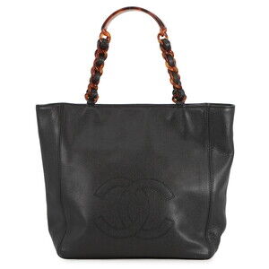 Chanel tote bag with a large Coco logo, plastic chain, tortoiseshell-like cav...